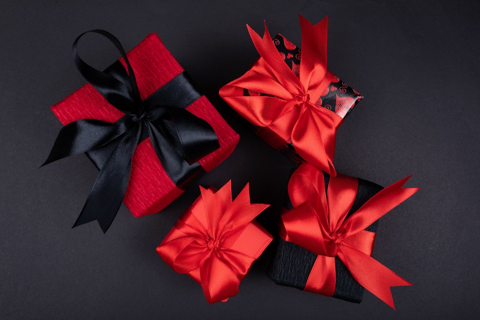 red ribbon on black textile