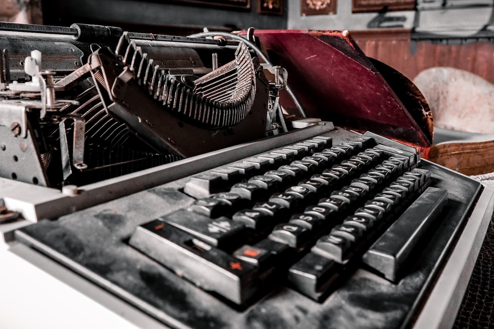 black and white typewriter on white table