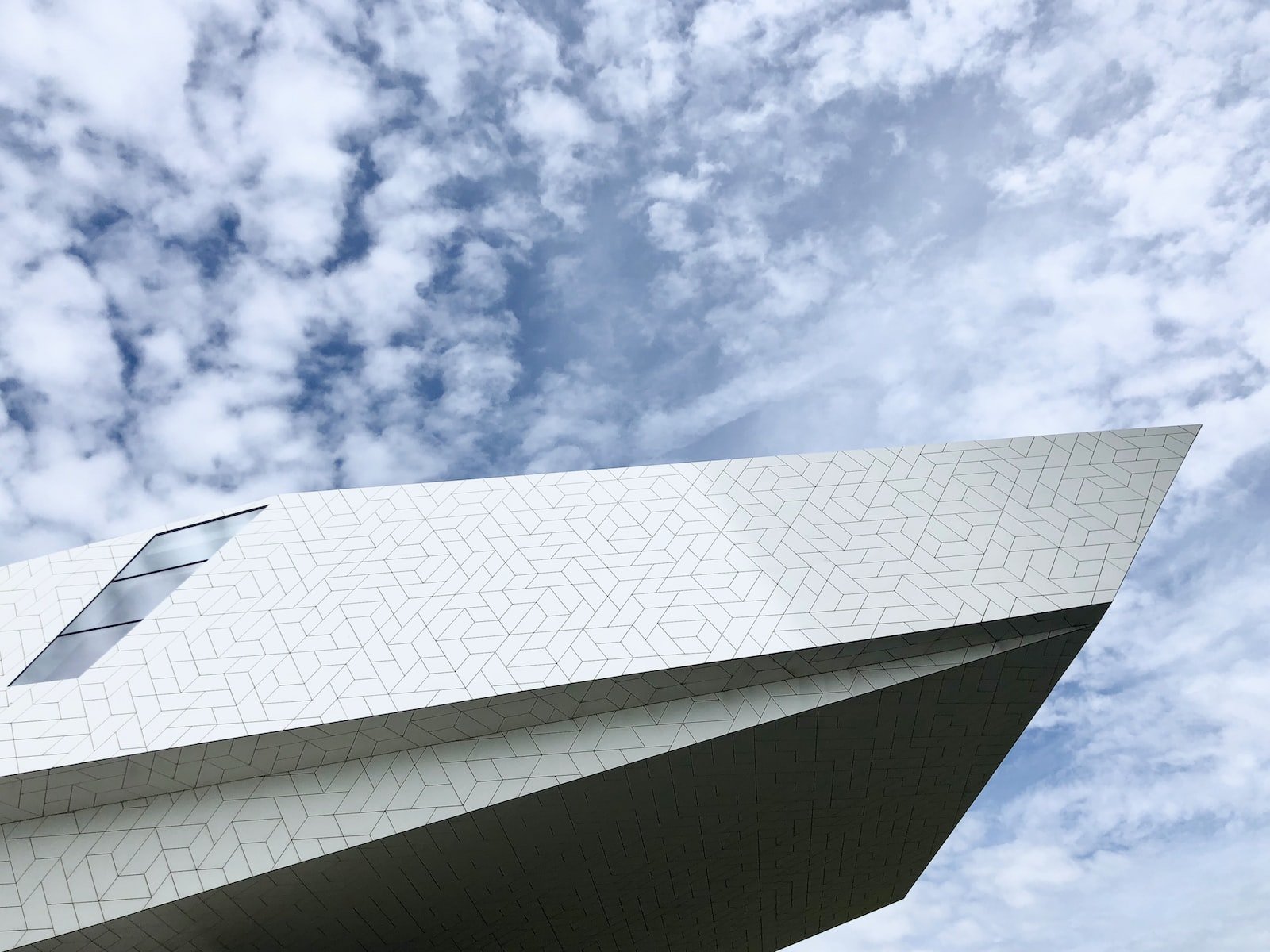 low angle photography of white and gray concrete house